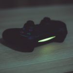 Playstation, controller, video games — Exploring Live Dealer Games at Online Casinos: A Comprehensive Guide